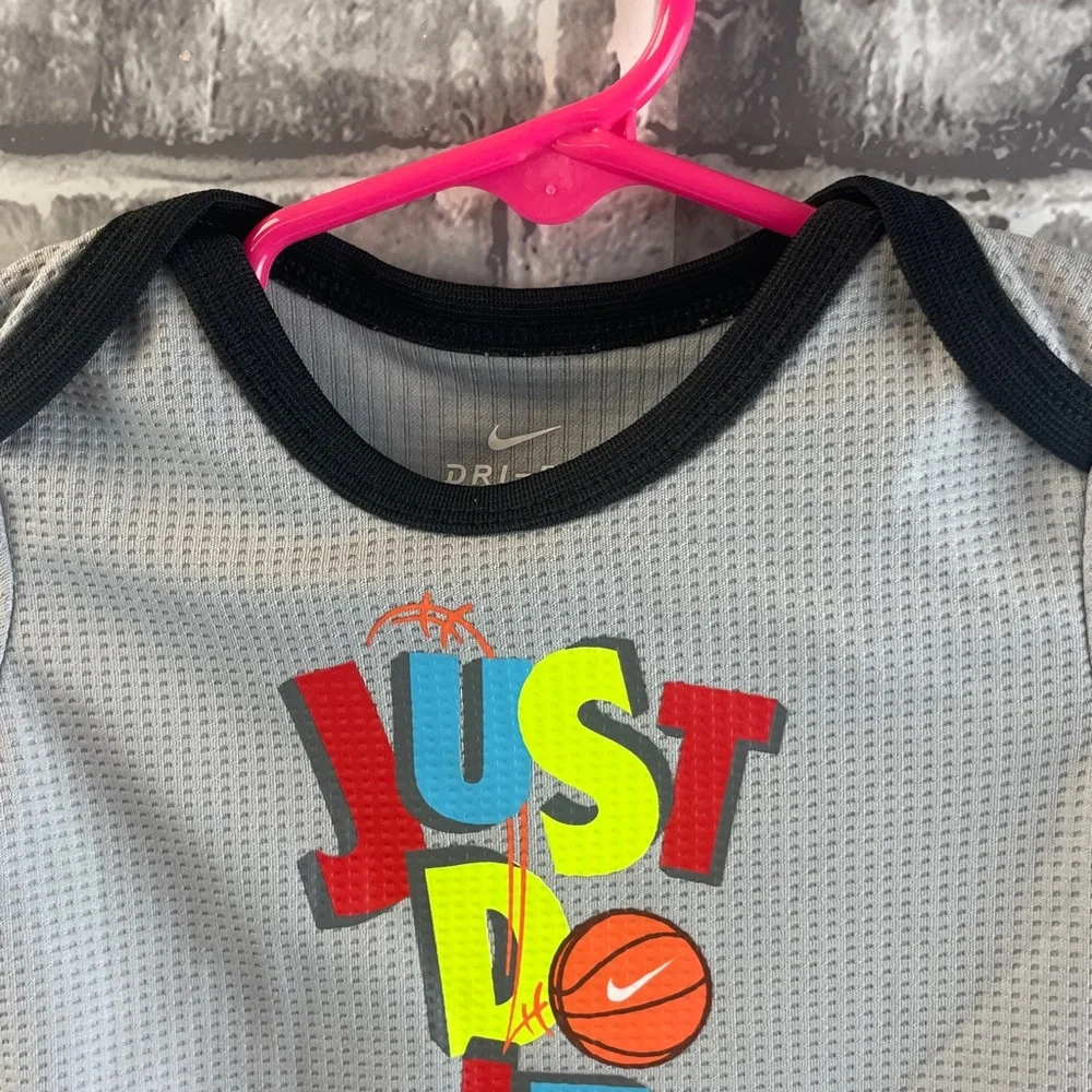 Nike Kids Gray onesie with Colorful Print‎